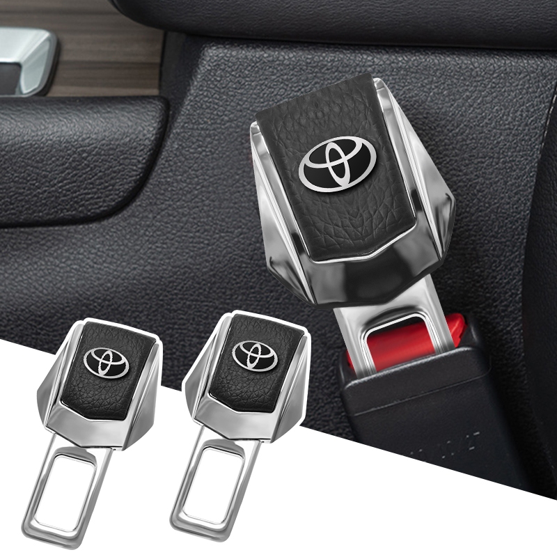 หัวเข็มขัดนิรภัยรถยนต์ แบบโลหะ สําหรับ Toyota Corolla Yaris Aygo Prius RAV4 Camry Auris 1 ชิ้น 2 ชิ้น