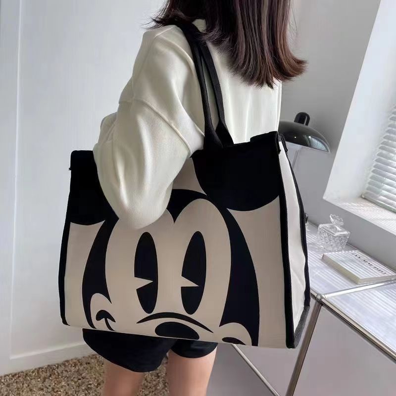 【จัดส่งจากประเทศไทย】 พร้อมส่ง กระเป๋าสะพายไหล่ ผ้าแคนวาส ทรงโท้ท ขนาดใหญ่ จุของได้เยอะ ลายการ์ตูน แฟชั่นฤดูร้อน สําหรับคุณแม่