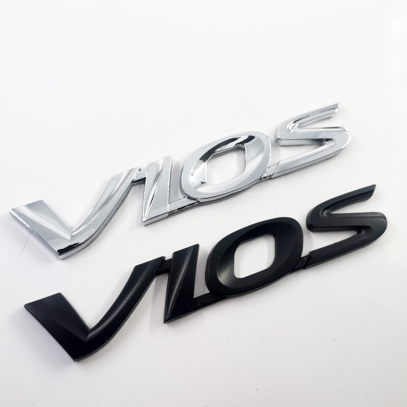 1 x ABS โครเมี่ยม สีดํา โลโก้ตัวอักษร VIOS รถ ตกแต่งอัตโนมัติ ตราสัญลักษณ์ สติกเกอร์ รูปลอก เปลี่ยนได้ สําหรับ TOYOTA