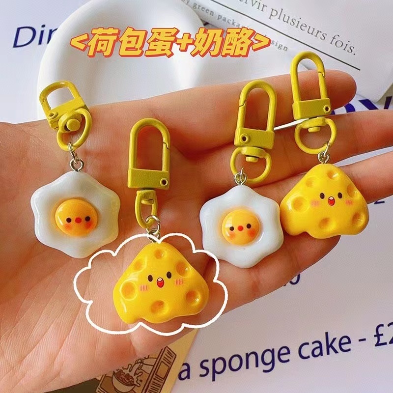 1pc พวงกุญแจ จี้ชีสไข่ดาวน้ํา น่ารัก ตลก การ์ตูน คาวาอี้ อาหารจําลอง ของเล่นเด็ก ของขวัญส่งเสริมการขาย