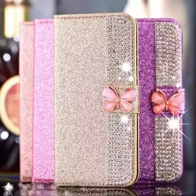BlingเพชรRhinestoneคริสตัลผีเสื้อสําหรับiPhone 18 17 11 12 13 14 15 16 Pro Max XS XR 7 PlusกรณีหนังGlitterแม่เหล็กพลิกกระเป๋าสตางค์ช่องใส่การ์ดที่วางโทรศัพท์ปกหนังสือ