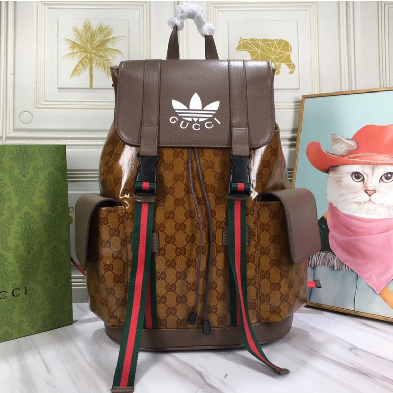 ของแท้ที่เคาน์เตอร์ Gucci's ใหม่ กระเป๋าเป้สะพายหลัง สําหรับผู้ชาย adidas x Gucci joint collection กระเป๋าเดินทาง