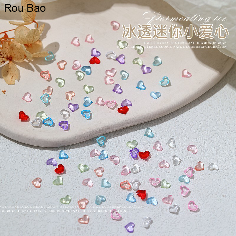 Rou Bao อุปกรณ์ตกแต่งเล็บ เรซิ่นใส รูปหัวใจ ขนาดเล็ก หลายสีสัน สําหรับตกแต่งเล็บ DIY 50 ชิ้น