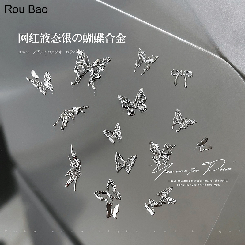 Rou Bao อุปกรณ์ตกแต่งเล็บ รูปปีกผีเสื้อ 3D สีเงิน สําหรับตกแต่งเล็บ 50 ชิ้น