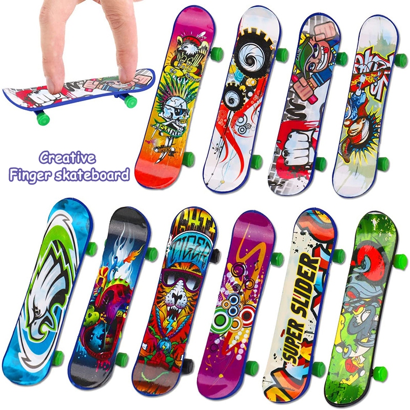ใหม่ Mini Finger Skateboard Fingerboard Finger Scooter Skate Boarding เกมของเล่นสร้างสรรค์ 迷你手指滑板