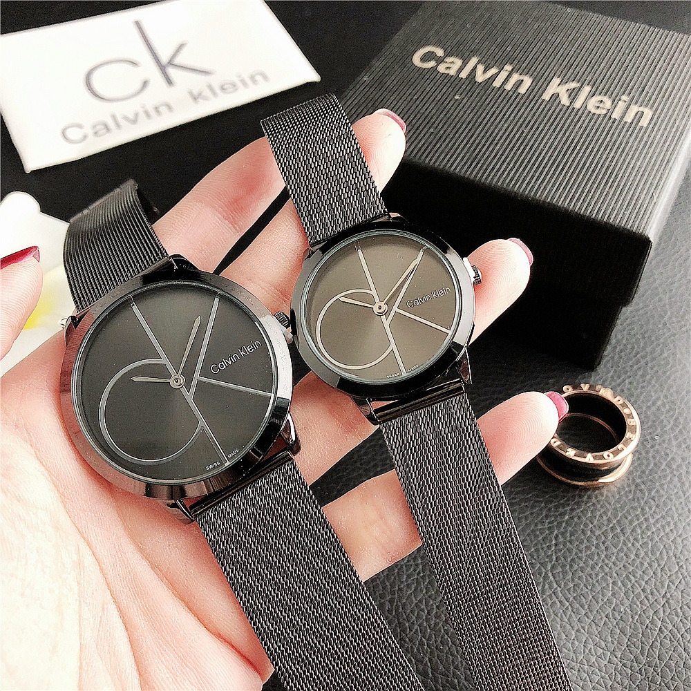Calvin Klein CK นาฬิกาข้อมือควอทซ์ สายสแตนเลส ลายโลโก้ สไตล์คลาสสิก สําหรับผู้ชาย ผู้หญิง