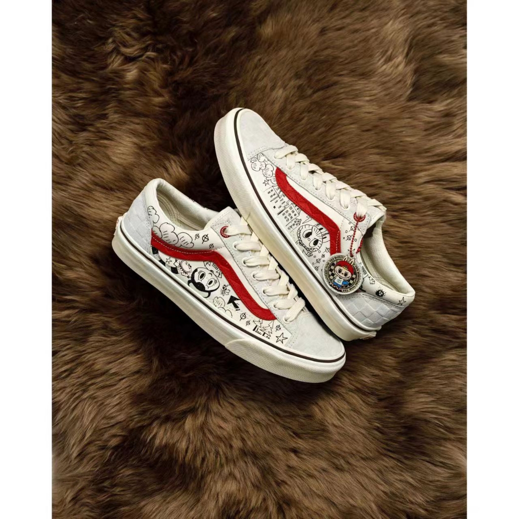 The MONSTERSxVansStyle36 รองเท้าผ้าใบลําลอง กันลื่น ซับแรงกระแทก ใส่สบาย ทนต่อการเสียดสี สําหรับผู้ชาย และผู้หญิง สีขาว