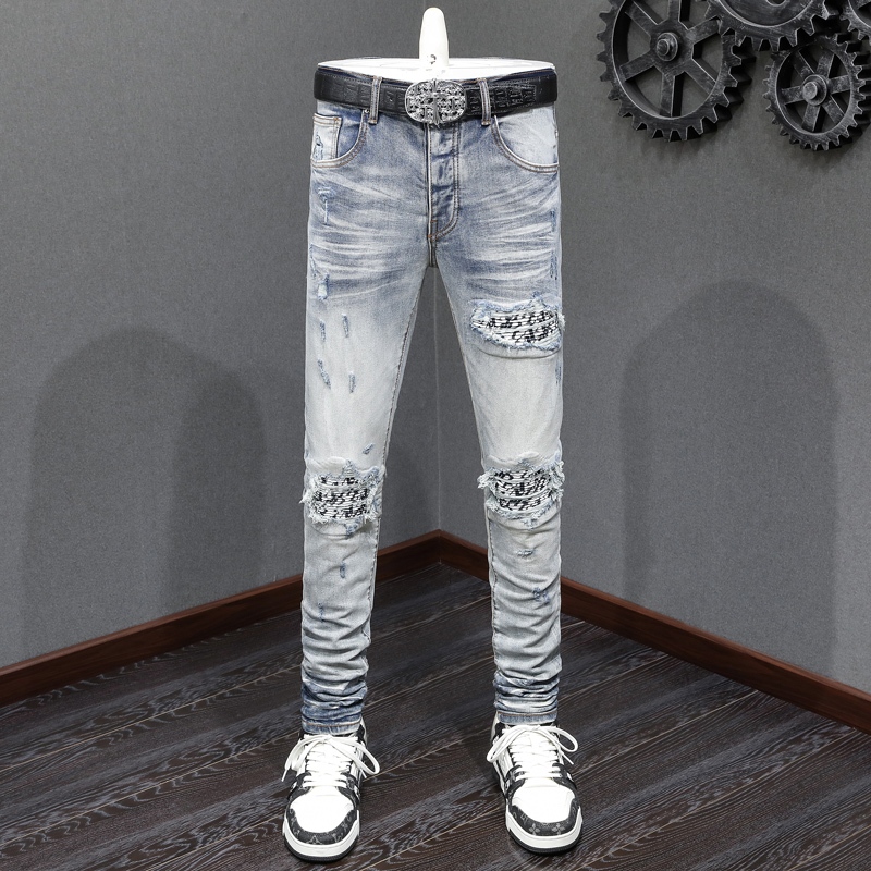 Amiri High Street แฟชั่นผู้ชายกางเกงยีนส์วินเทจสีฟ้าผอมพิมพ์แพทช์ประกบฝีมือดีปุ่มผู้ชายสไตล์ฮิปฮอปกางเกงยีนส์