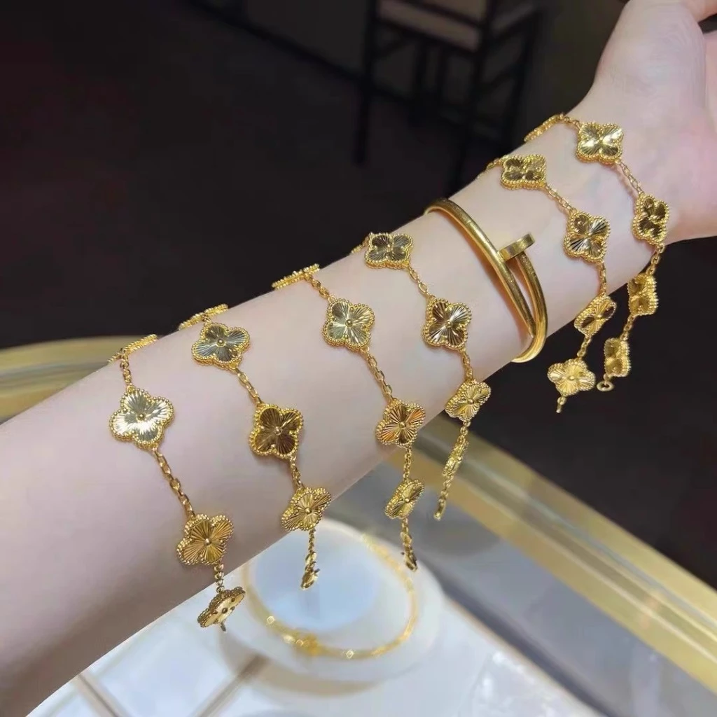 สร้อยข้อมือ จี้ใบโคลเวอร์สี่แฉก สีทอง สีเงิน คุณภาพสูง เหมาะกับของขวัญวันเกิด แฟชั่นเกาหลี สําหรับผู้หญิง
