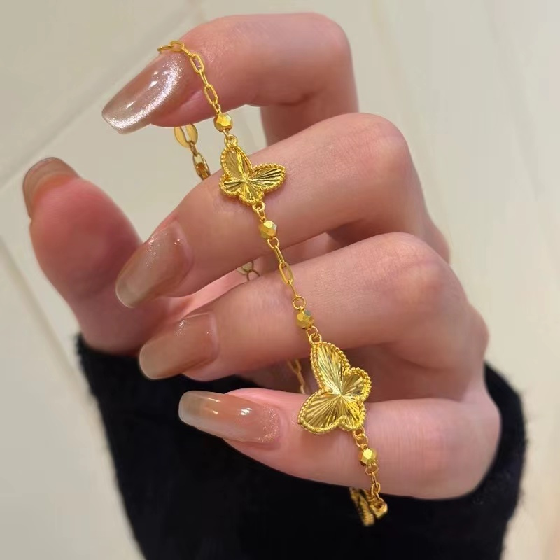 สร้อยคอ สร้อยข้อมือไทเทเนียม จี้รูปผีเสื้อ ใบโคลเวอร์สี่แฉก ประดับพู่ สไตล์ฝรั่งเศส เครื่องประดับ สําหรับผู้หญิง
