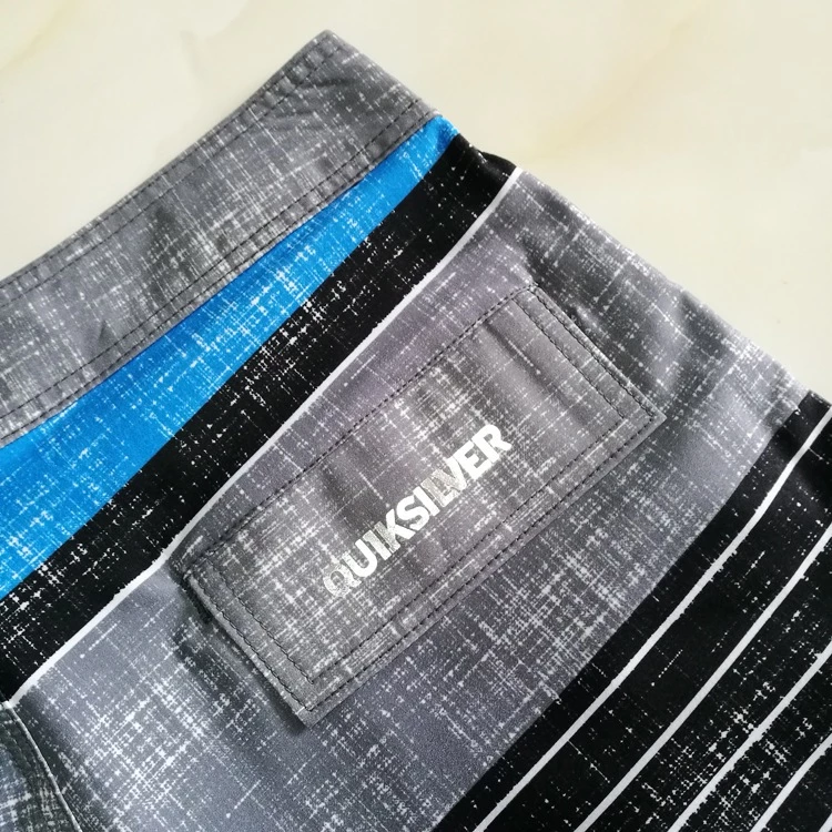 Quiksilver กางเกงขาสั้นยืดหยุ่น 4 ทิศทาง กันน้ำแห้งเร็ว สำหรับผู้ชาย thumbnail 5