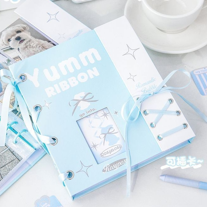 ริบบิ้นสุนทรียศาสตร์ Laced-up Hollow Magnetic Card Book Simple High-value A6 Non-attribute Card Book 6-hole Four-square Grid Polaroid Handbook หนังสืออัลบั้มปกแข็งการ์ดNicheโปสการ์ดAidou Star Chasing Card Book