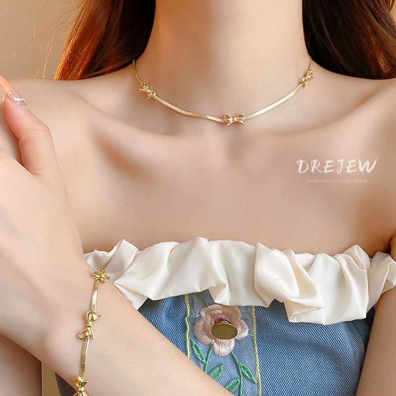 DREJEW ชุดสร้อยคอโช้คเกอร์ ประดับโบว์ เรียบง่าย ทันสมัย ระดับไฮเอนด์ ไหปลาร้าส่วนบุคคล โซ่การเดินทาง เครื่องประดับใหม่