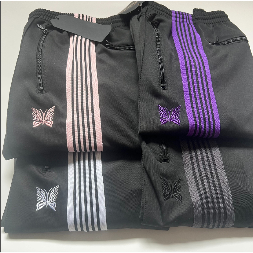 ผีเสื้อปักสายรัดด้านข้างตรงกีฬากางเกงลําลองผู้ชายผู้หญิงสไตล์เดียวกัน