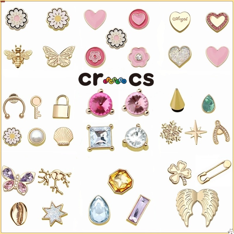 Cross Jibbilz จิ๊บบิทซ์ ข้ามไม่ซ้ําน่ารัก ทําเอง ดอกไม้แบบโลหะรองเท้าหัวเข็มขัดหลุมอุปกรณ์เสริมตกแต่งคุณภาพสูงอัญมณีผีเสื้อเครื่องประดับสร้างสรรค์โลหะสี่แฉกโคลเวอร์หัวเข