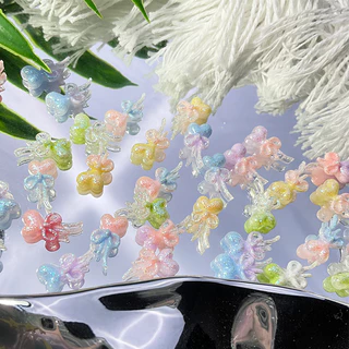 Rou Bao 50 ชิ้นเล็บที่มีสีสันโบว์ริบบิ้นหัวใจผสม Girly ความงามผสมเรซิ่นเล็บ Art DIY Charms ตกแต่ง