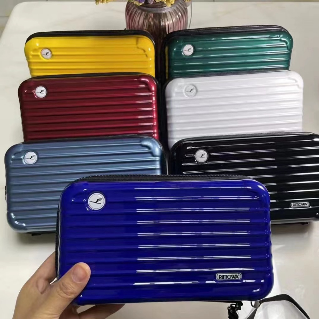 Rimowa กระเป๋าแต่งหน้าขนาดเล็ก PC เดียวกัน, กระเป๋าล้างกันน้ําข้ามคืนและกระเป๋าการบิน, มีให้เลือกหลายสี