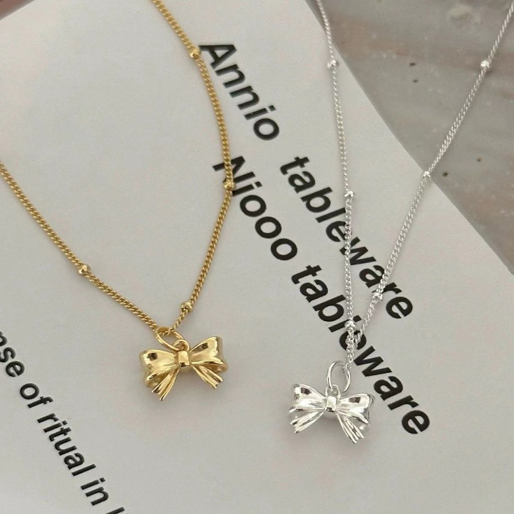 Bowknot สร้อยคอเงินสเตอร์ลิงฝรั่งเศสกลุ่มเฉพาะออกแบบพรีเมี่ยมความรู้สึกคอ Chainmail กระดูกโซ่ผู้หญิงทองแสงหรูหราใหม่