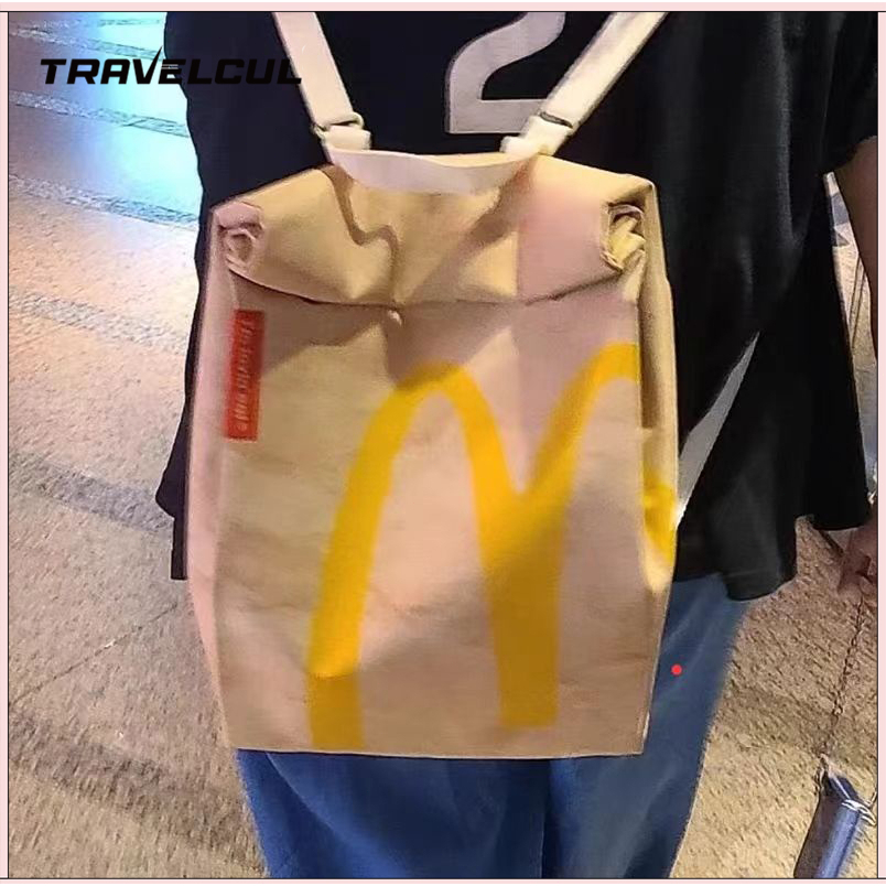 Travelcul Mcdonald กระเป๋ากระดาษกระเป๋าเป้สะพายหลังผู้หญิงกระเป๋าเป้สะพายหลังขนาดใหญ่ความจุกระเป๋านักเรียน Casual Messenger กระเป๋า