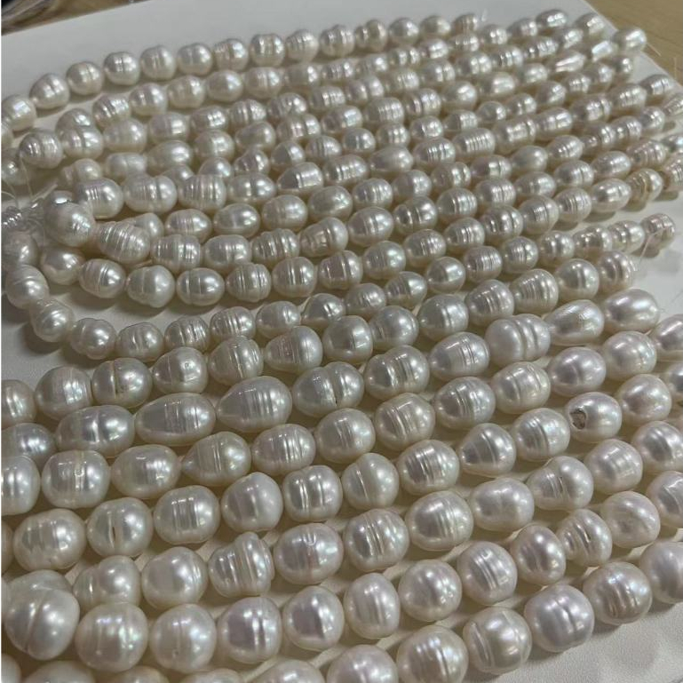 ความยาว 18 ซม . 9-10 มม . /11-12 มม . รูปข ้ าวมุกน ้ ําจืดธรรมชาติ