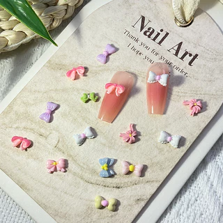 Rou Bao 50 ชิ้นเล็บโบว์ที่มีสีสันรูปที่แตกต่างกันน่ารัก Girly เล็บเรซิ่น Art DIY Charms ตกแต่ง