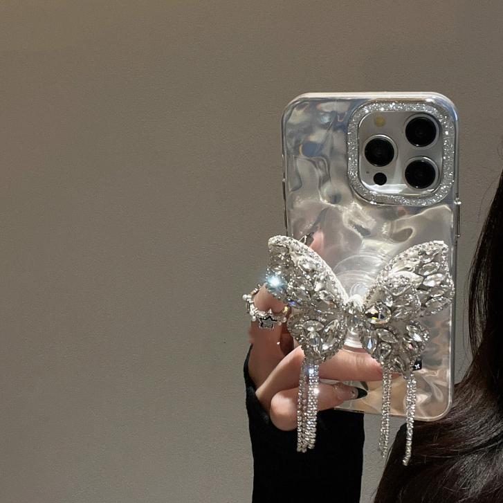 Rhinestone พู่ผีเสื้อขาตั้งลูกฟูกเคสโทรศัพท์เหมาะสําหรับ iPhone 17 Air 16 15 Plus 14 13 12 11 Pro Max