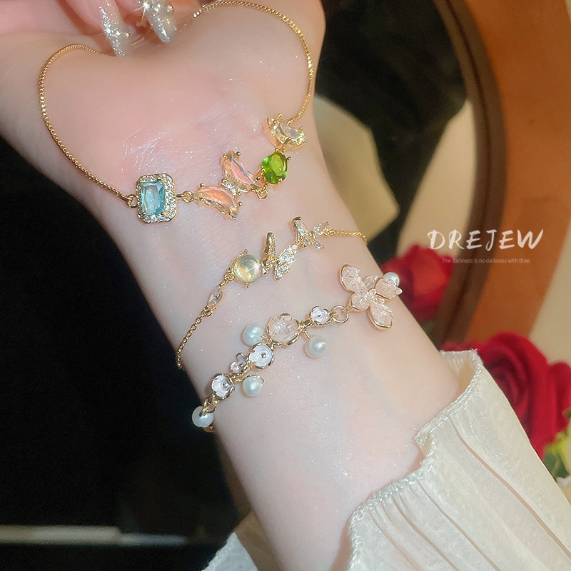 DREJEW เดรช ทอง 18เค สไตล์เกาหลีพาสเทลเพทายสร้อยข้อมือผีเสื้อหวานสร้อยข้อมือดอกไม้ระดับไฮเอนด์สร้อยข้อมือสไตล์เจ้าหญิง