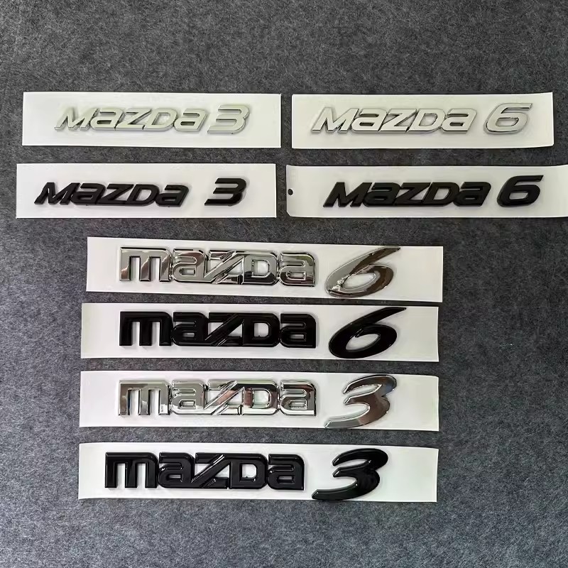 สติกเกอร์โลโก้ ABS โครเมี่ยม 6 ตัวอักษร สีดํา แบบเปลี่ยน สําหรับ MAZDA 3 MAZDA 1 ชิ้น