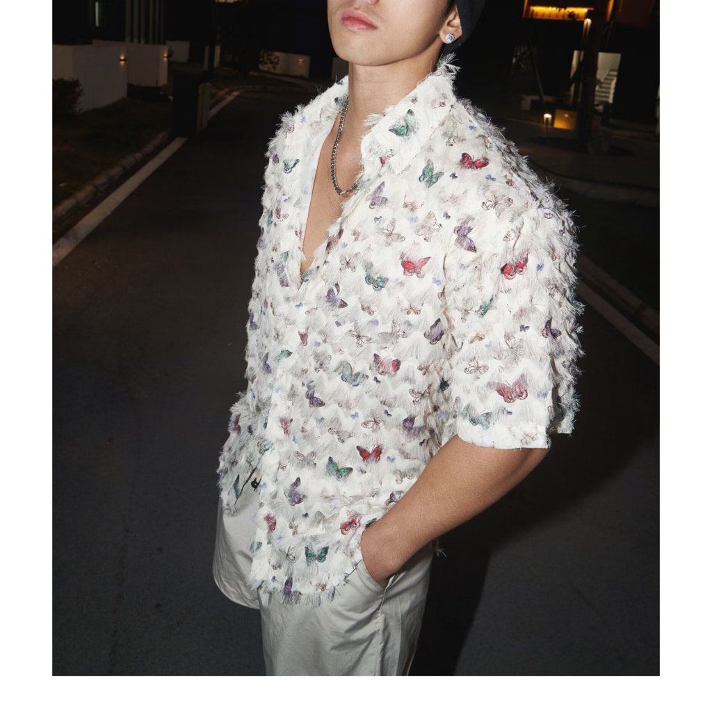 เสื้อเชิ้ตแขนยาว พิมพ์ลายผีเสื้อ ประดับพู่ สามมิติ สไตล์อเมริกัน เหมาะกับฤดูใบไม้ผลิ สําหรับผู้ชาย