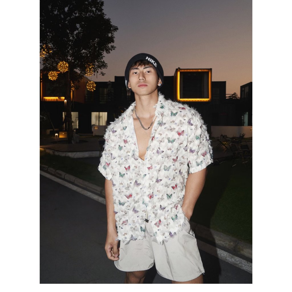 เสื้อเชิ้ตแขนยาว พิมพ์ลายผีเสื้อ ประดับพู่ สามมิติ สไตล์อเมริกัน เหมาะกับฤดูใบไม้ผลิ สําหรับผู้ชาย