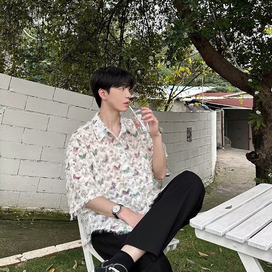 เสื้อเชิ้ตแขนยาว พิมพ์ลายผีเสื้อ ประดับพู่ สามมิติ สไตล์อเมริกัน เหมาะกับฤดูใบไม้ผลิ สําหรับผู้ชาย