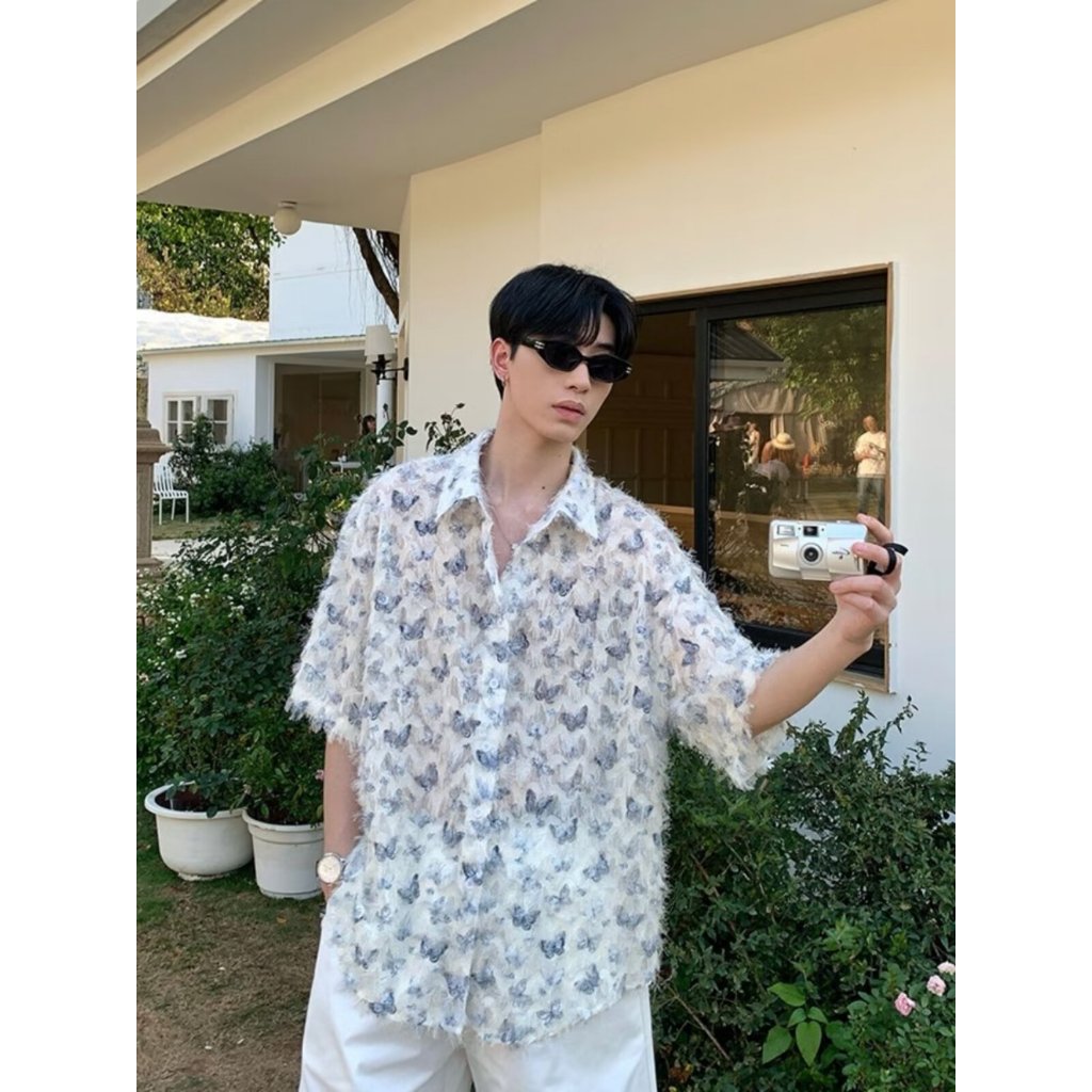 เสื้อเชิ้ตแขนยาว พิมพ์ลายผีเสื้อ ประดับพู่ สามมิติ สไตล์อเมริกัน เหมาะกับฤดูใบไม้ผลิ สําหรับผู้ชาย