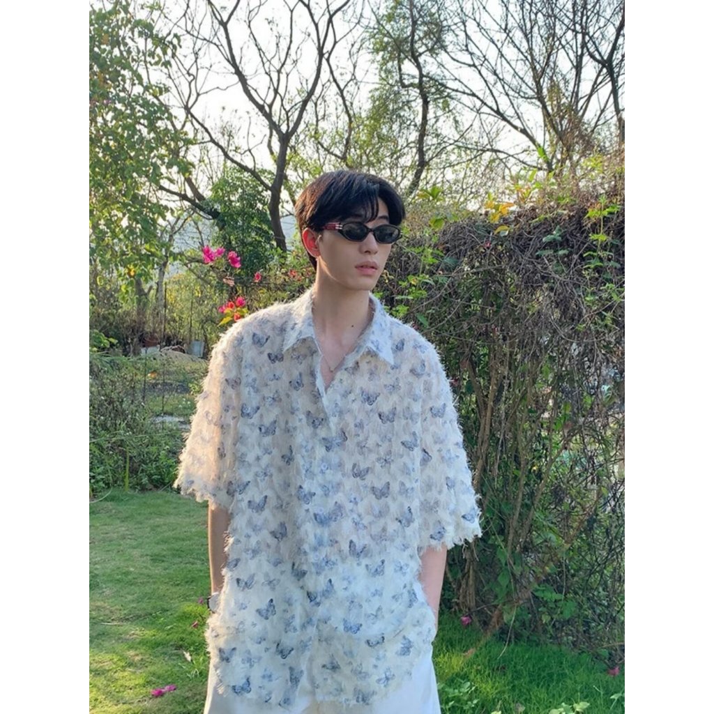 เสื้อเชิ้ตแขนยาว พิมพ์ลายผีเสื้อ ประดับพู่ สามมิติ สไตล์อเมริกัน เหมาะกับฤดูใบไม้ผลิ สําหรับผู้ชาย