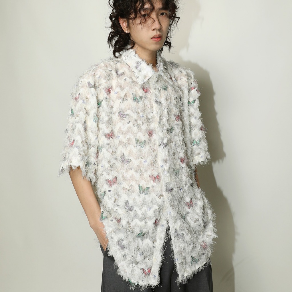 เสื้อเชิ้ตแขนยาว พิมพ์ลายผีเสื้อ ประดับพู่ สามมิติ สไตล์อเมริกัน เหมาะกับฤดูใบไม้ผลิ สําหรับผู้ชาย