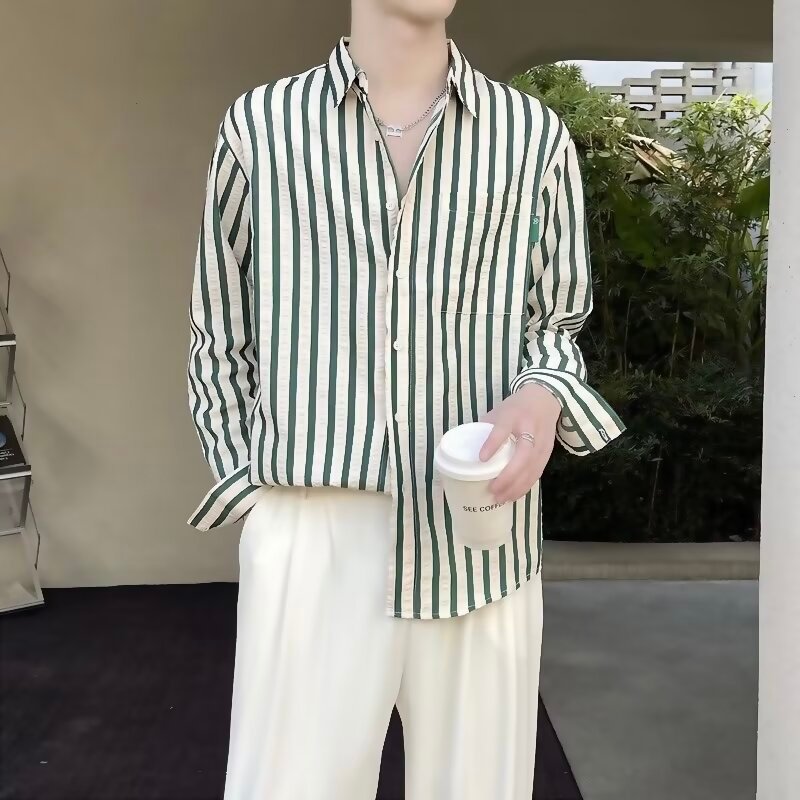 เวอร์ชั่นเกาหลีลายเส้นแนวตั้งเสื้อเชิ้ตแขนยาวผู้ชาย ม-3เอ็กแอล ฤดูใบไม้ผลิฤดูใบไม้ร่วงหล่อวรรณกรรมสไตล์ลําลองนิ้วเสื้อผู้ชายอินเทรนด์ คนพาล หล่อหลวมเสื้อผู