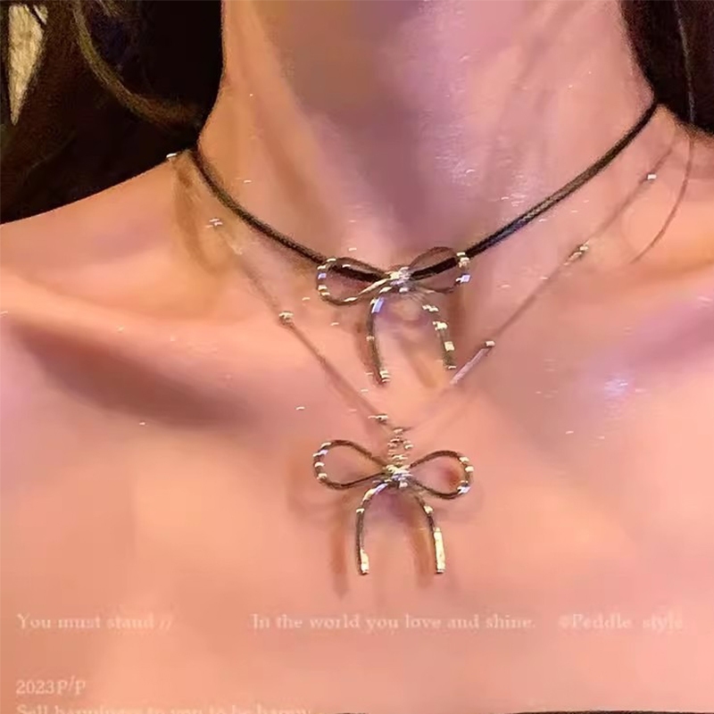 สร ้ อยคอหนังวินเทจหวาน Cool Bow Clavicle Chain Choker อุปกรณ ์ เสริมสําหรับสร ้ อยคอผู ้ หญิง - รูปที่ 4