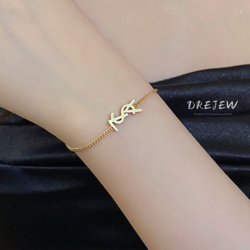 DREJEW เดรช ครอบครัวศักดิ์สิทธิ์สร้อยข้อมือตัวอักษรคลาสสิกเรียบง่ายอเนกประสงค์แฟชั่นแสงหรูหราส่วนบุคคลอินเทรนด์และอารมณ์โลหะและเครื่องประดับมือระดับไฮเอ