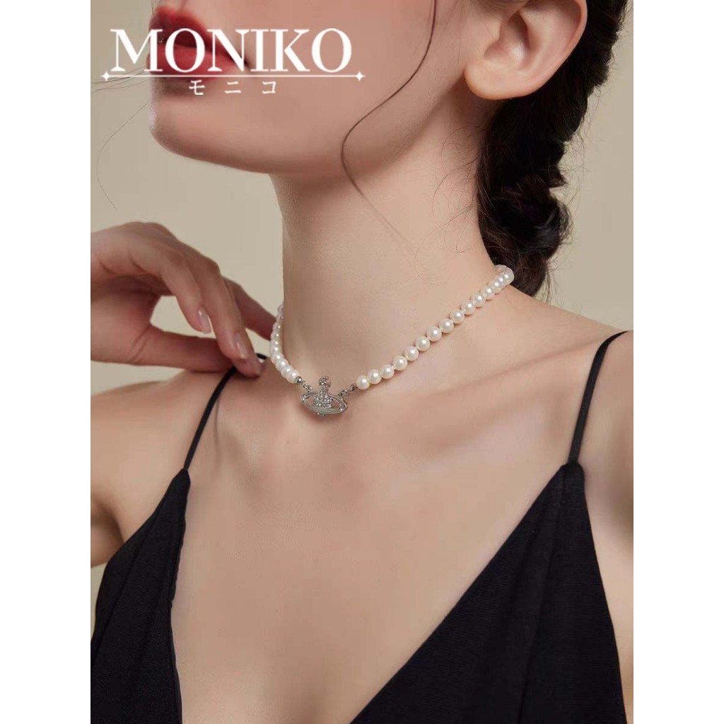 MONIKO สร้อยคอ ประดับลูกปัด ลายดาวเสาร์ สีดํา แฟชั่นสําหรับชาย และหญิง