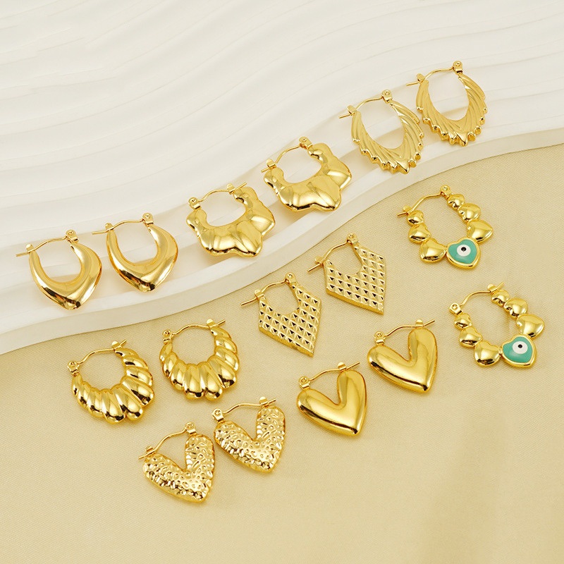 Ht ยุโรปอเมริกัน High-End ต่างหูเหล็กไทเทเนียมหญิงสแตนเลสชุบ 18K Gold Retro Green Eye ต่างหู Hypoallergenic