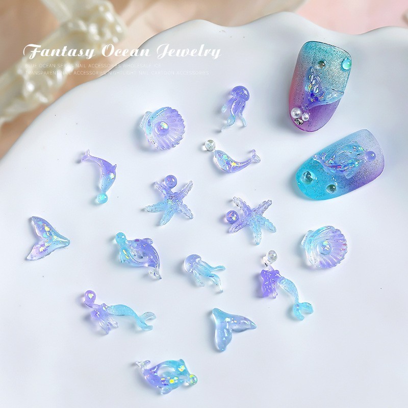 50 ชิ้นเล็บ Blue Dream Ocean Series แมงกะพรุน Dolphin Shell การ์ตูนเรซิ่นเล็บ Art DIY Charms ตกแต่ง
