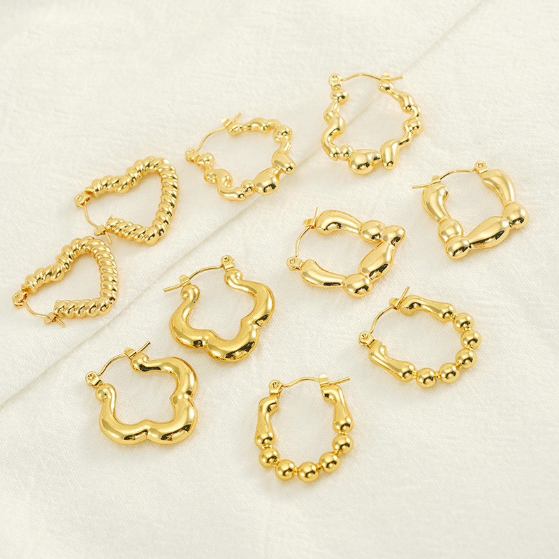 Ht เวอร์ชั่นเกาหลีไทเทเนียมเหล็กหัวใจลูกปัดไม่ซีดจางต่างหูสแตนเลสชุบ 18K Gold ไม่สม่ําเสมอต่างหูระดับไฮเอนด์