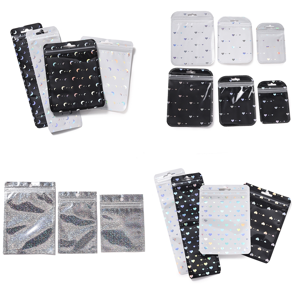 ถุงแก้ว ถุงโฮโลแกรม  50ใบ สีดำ-ขาว ลายหัวใจ-ดวงจันทร์ สำหรับจัดเก็บเครื่องประดับ