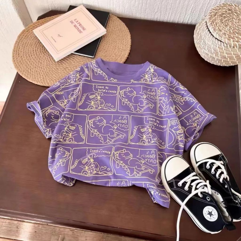 แขนสั้นเด็กชายฤดูร้อนฤดูร้อนสไตล์ใหม่สีม่วงการ์ตูนไดโนเสาร์เสื้อยืดอินเทรนด์สบายๆเด็ก ที่รัก