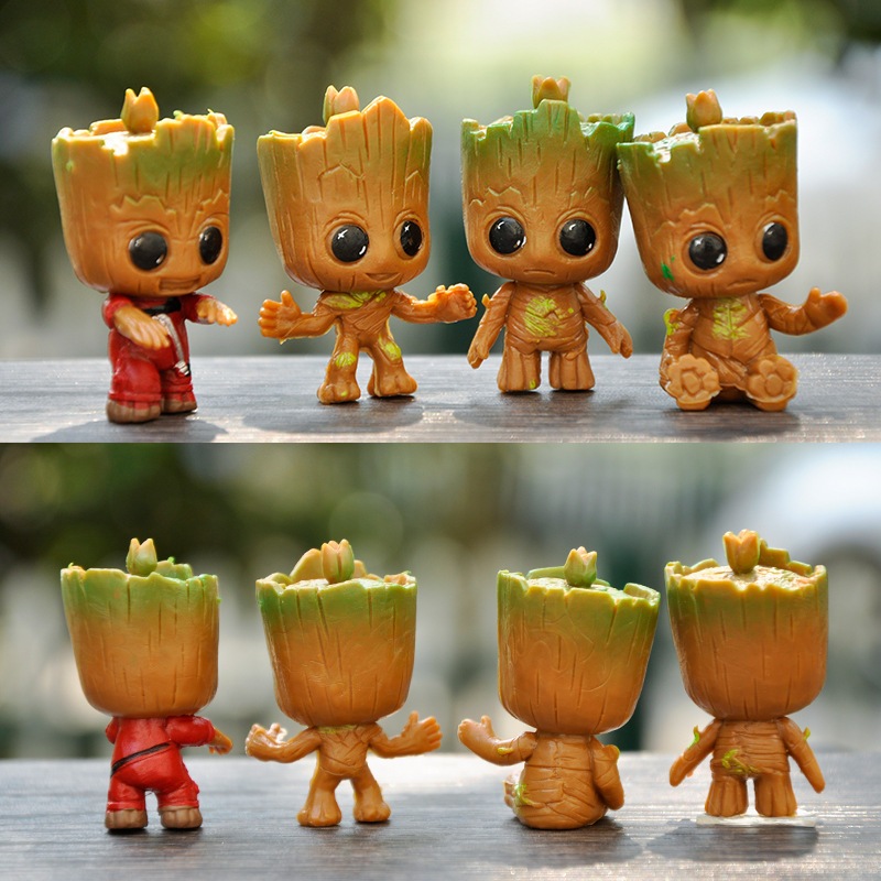 4 ชิ้น/เซ็ต 4.5 ซม.อะนิเมะ Guardians of the Galaxy รูป Groot เด็กซูเปอร์ฮีโร่น่ารักขนาดเล็ก Groot รุ่น Q PVC ตัวเลขการกระทําตุ๊กตาของเล่น