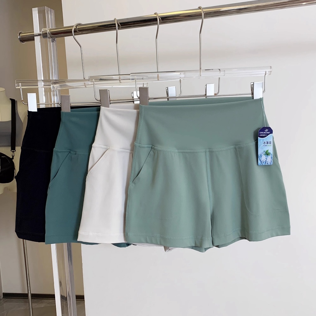 Fly Yogaice Mint Nude Yoga Short Pant ผู้หญิง Hip-Lifting เอวสูงฟิตเนสกางเกงร้อนพร้อมกระเป๋า