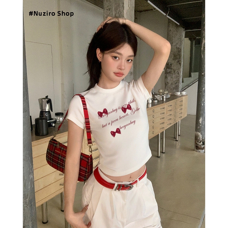 Nuziro Baby Tee - เสื้อยืดแขนสั้นพิมพ์ลายโบว์แฟชั่นสําหรับผู้หญิง #T000434