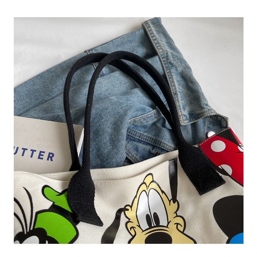 [กรุงเทพฯ จัดส่ง] กระเป๋าสะพายผ้าแคนวาสเกาหลียอดนิยมกระเป๋าถือมีซิปกระเป๋าผ้าการ์ตูนความจุขนาดใหญ่พิมพ์การ์ตูนเหมาะสําหรับผู้หญิงแ - รูปที่ 2