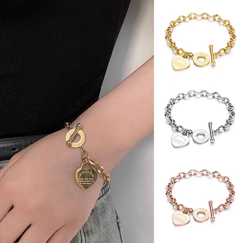 เงาไทเทเนียมเหล็ก OT หัวเข็มขัดรักสร้อยข้อมือวัสดุสแตนเลสจะไม่จางหายซอกออกแบบสบายๆเหล็กไทเทเนียมสุภาพสตรีสร้อยข้อมือ