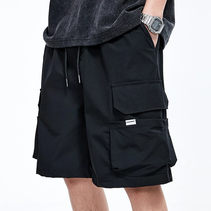 M-5XL กางเกงขาสั้นผู้ชาย ฤดูร้อนแฟชั่นหลวมขนาดบวกกางเกงขาสั้นคาร์โก้หลายกระเป๋าลำลอง