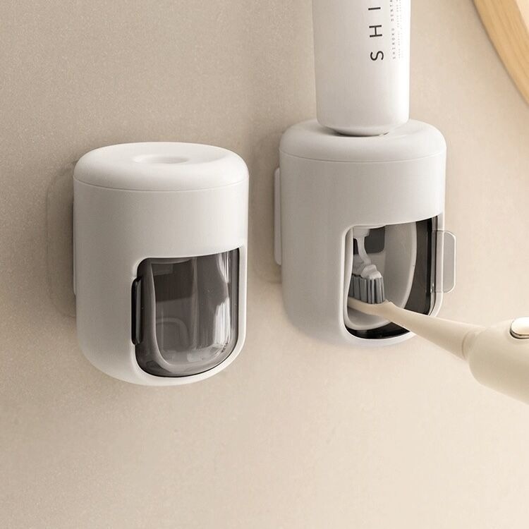 DDhome เครื่องบีบยาสีฟันอัตโนมัติติดผนังแบบไม่เจาะรูที่แขวนยาสีฟันที่คั้น